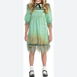 Never worn creepy girl Halloween costume . Youth size large 12-14